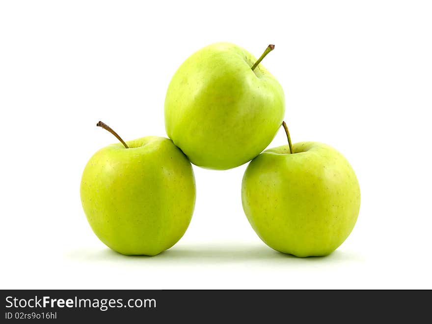 Studio shot of three green apples on white background