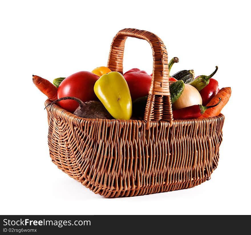 Basket filled with fresh vegetables from a kitchen garden. Basket filled with fresh vegetables from a kitchen garden