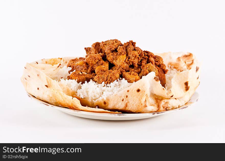 Rice and pork prepared in  Indian style