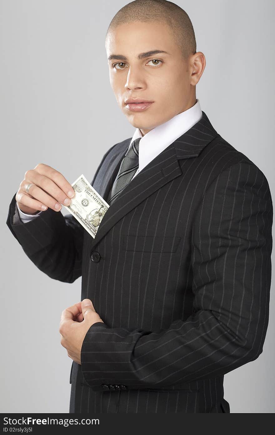 Good Looking Businessman On Gray