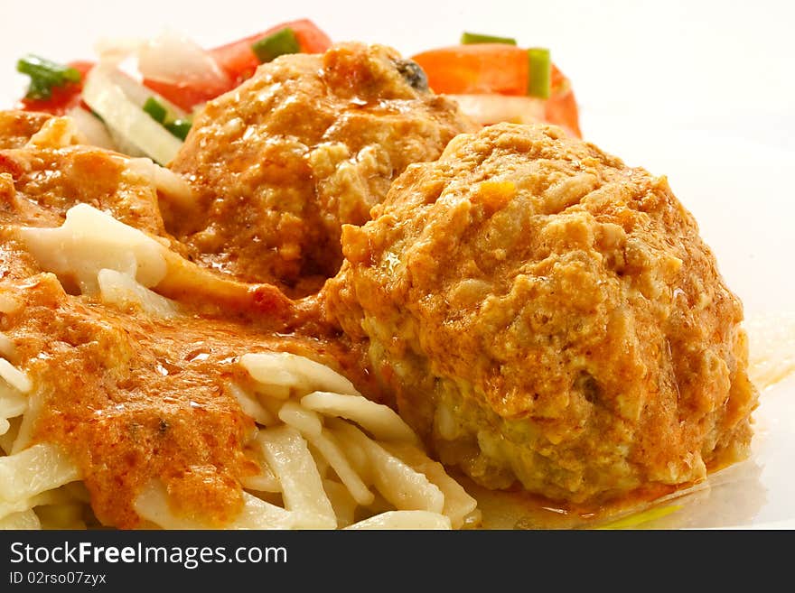 Meatballs with pasta with cream-tomato sauce. Meatballs with pasta with cream-tomato sauce