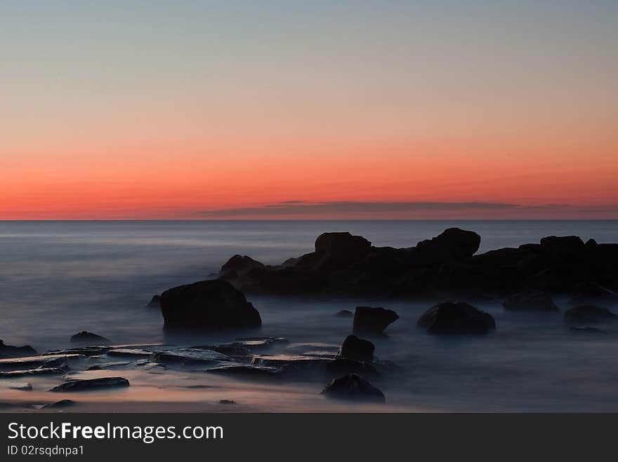 Beach jetty early  before sunrise