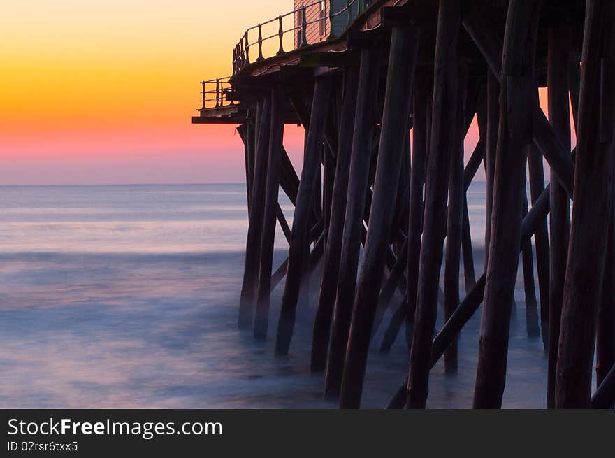 Fishing pier in North Carolina at sunrise. Fishing pier in North Carolina at sunrise