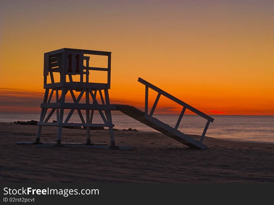 Lifeguard chair on beach in early morning