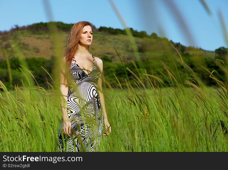 Woman and green grass