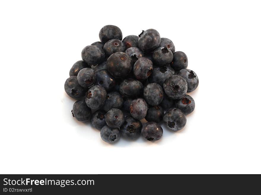 Several blueberries on the white isolated background.