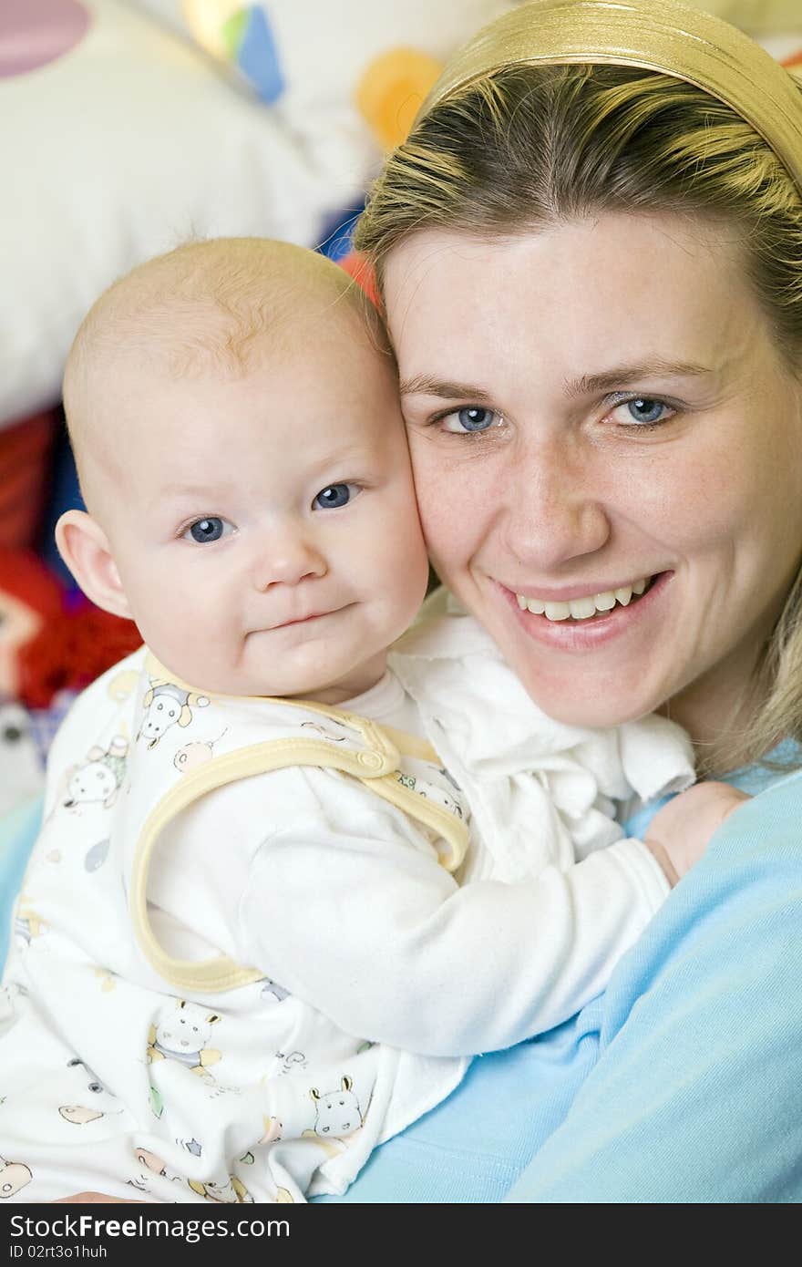 Portrait of mother with her baby