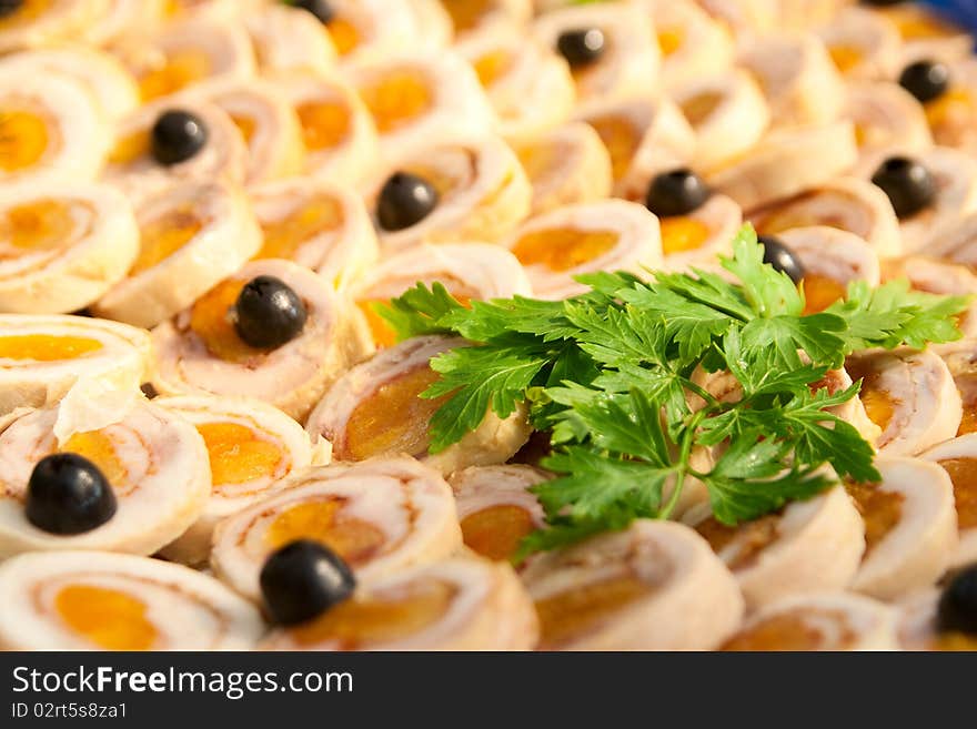 Ham Roll With Dried Apricots, Olives And Parsley.