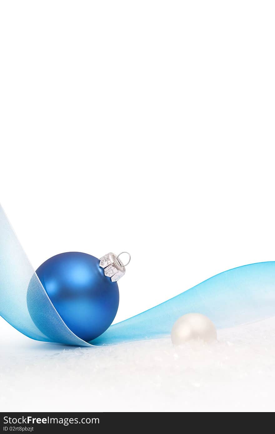 Blue bauble and soft ribbon