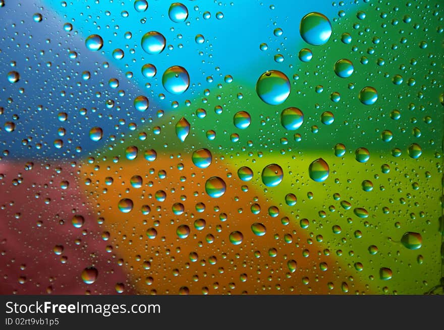 Many little water drops on the glass(multicolor). Many little water drops on the glass(multicolor)