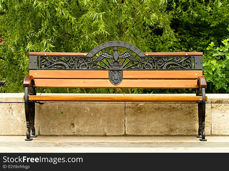 Bench in the park in Bucharest, Romania (the engravings say the name of the city)