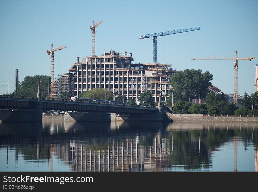 Jib crane construct building near the river