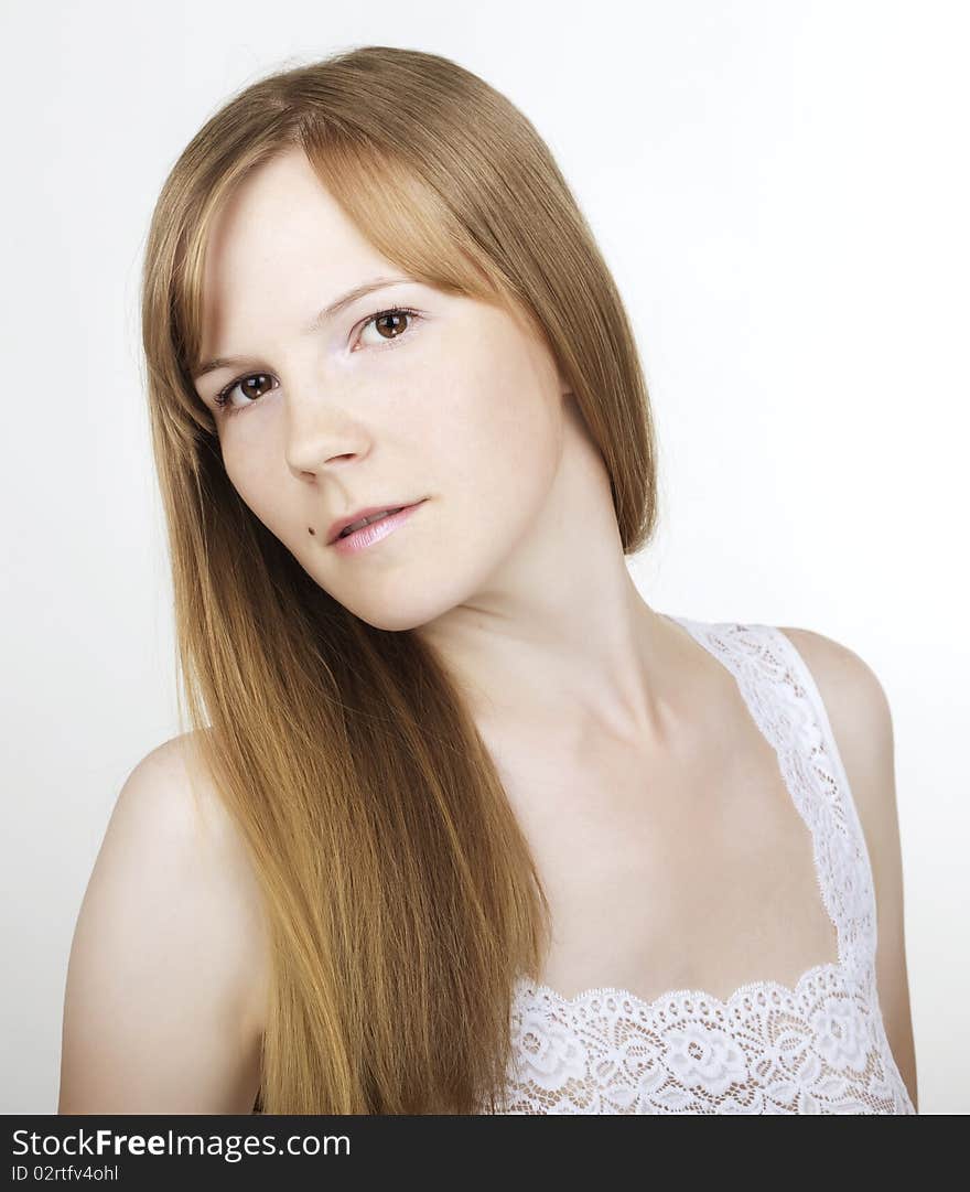 Young woman with luxuriant healthy long hair