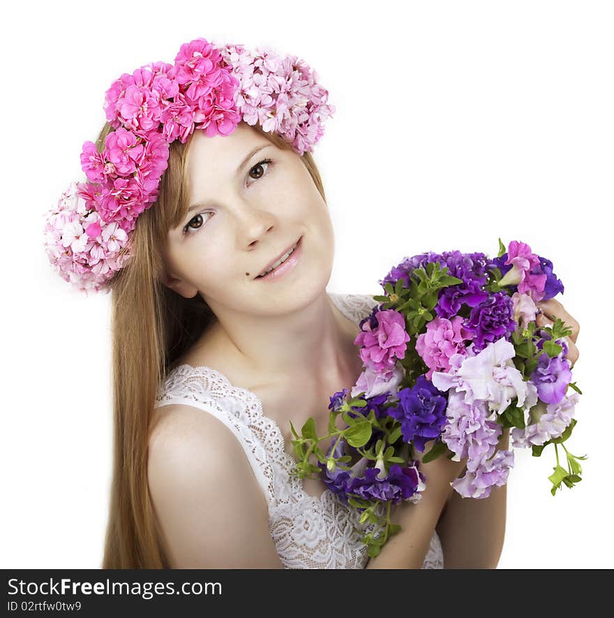 Image of beautiful young woman with wreath of flowers