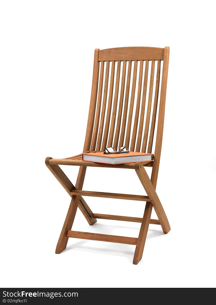 A deck chair isolated against a white background