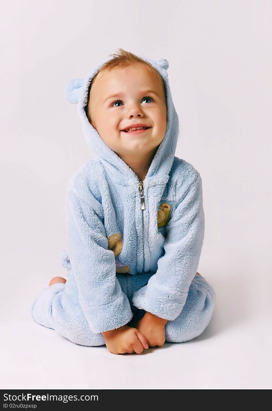 Child in blue suit, studio shot