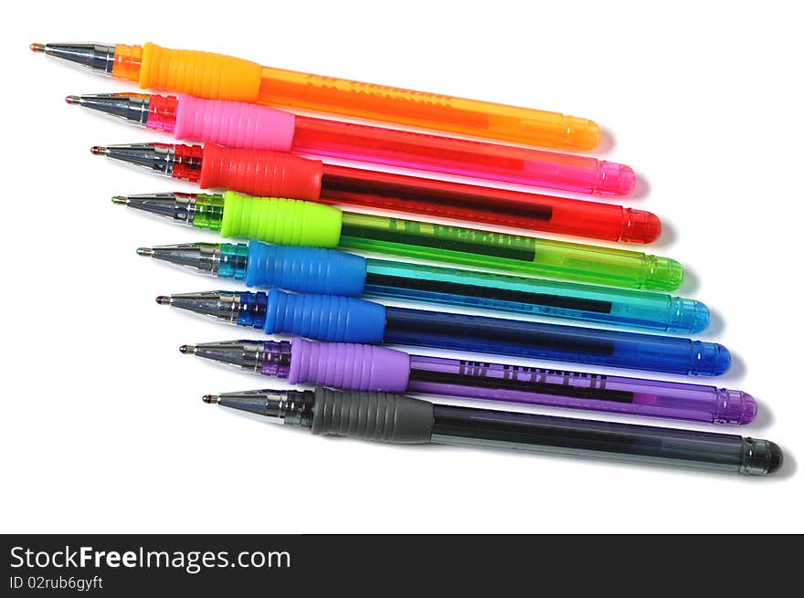 Assortment of colored ball-pen over white