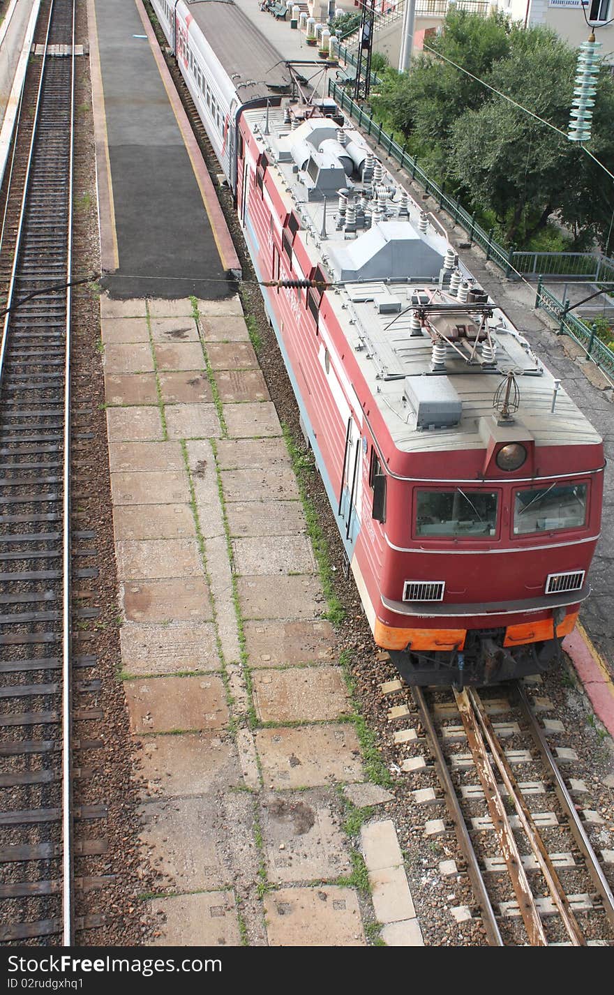 Red train on the railroad