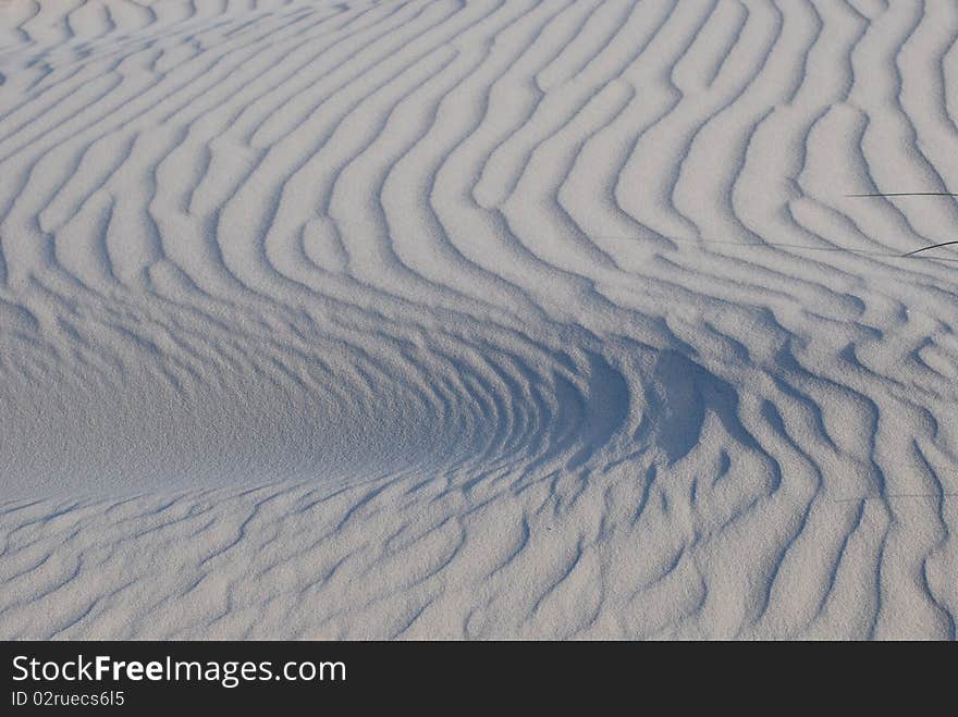 Sand dunes with blue sky