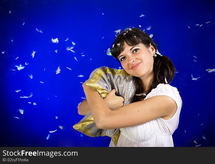 Woman hugs the pillow