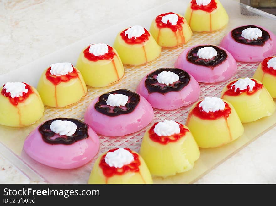 Jelly cakes with  chocolate and jam on the tops