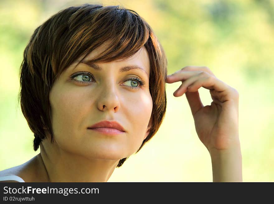 Face of a young girl being in nature