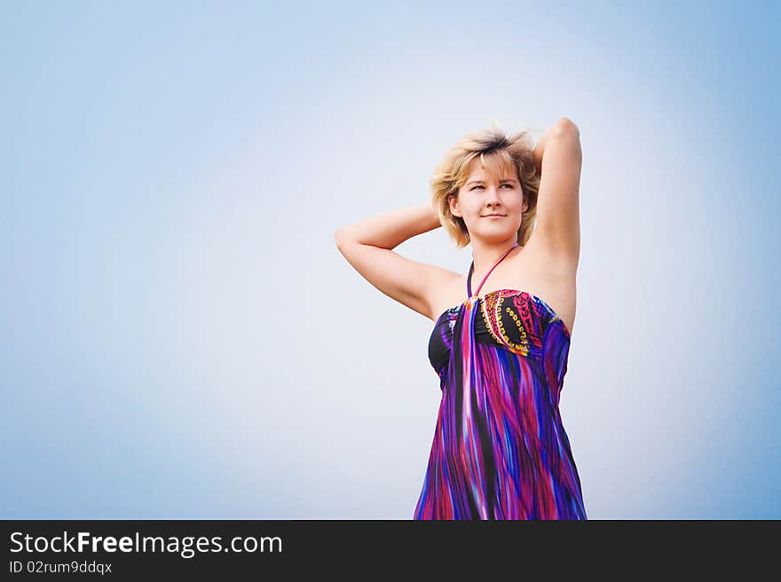 Young beautiful girl on a meadow