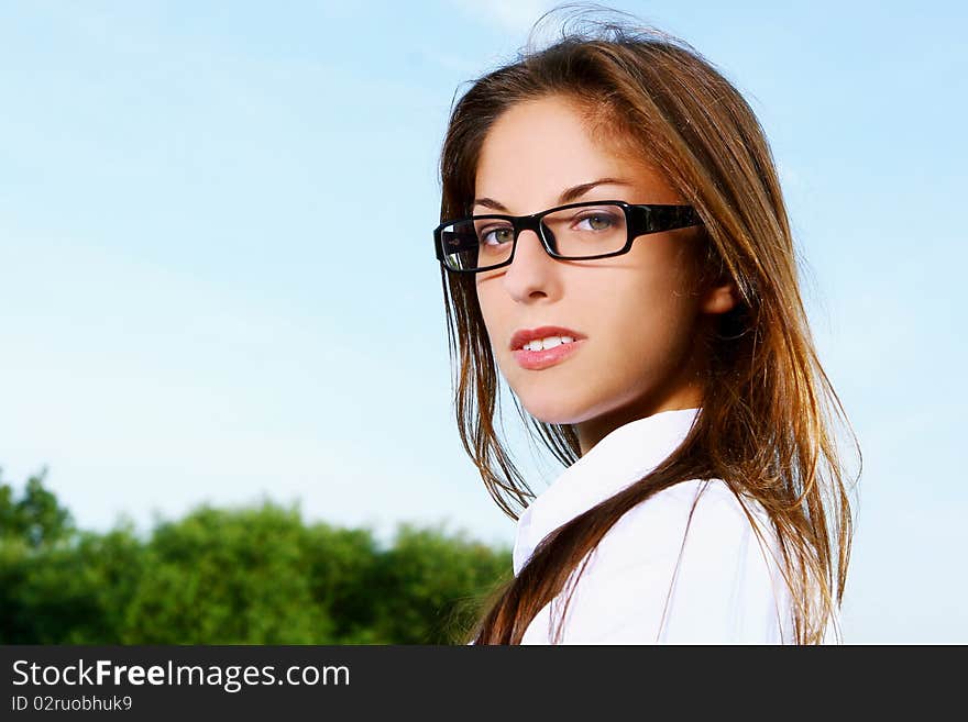 Young and beautiful girl doing home work