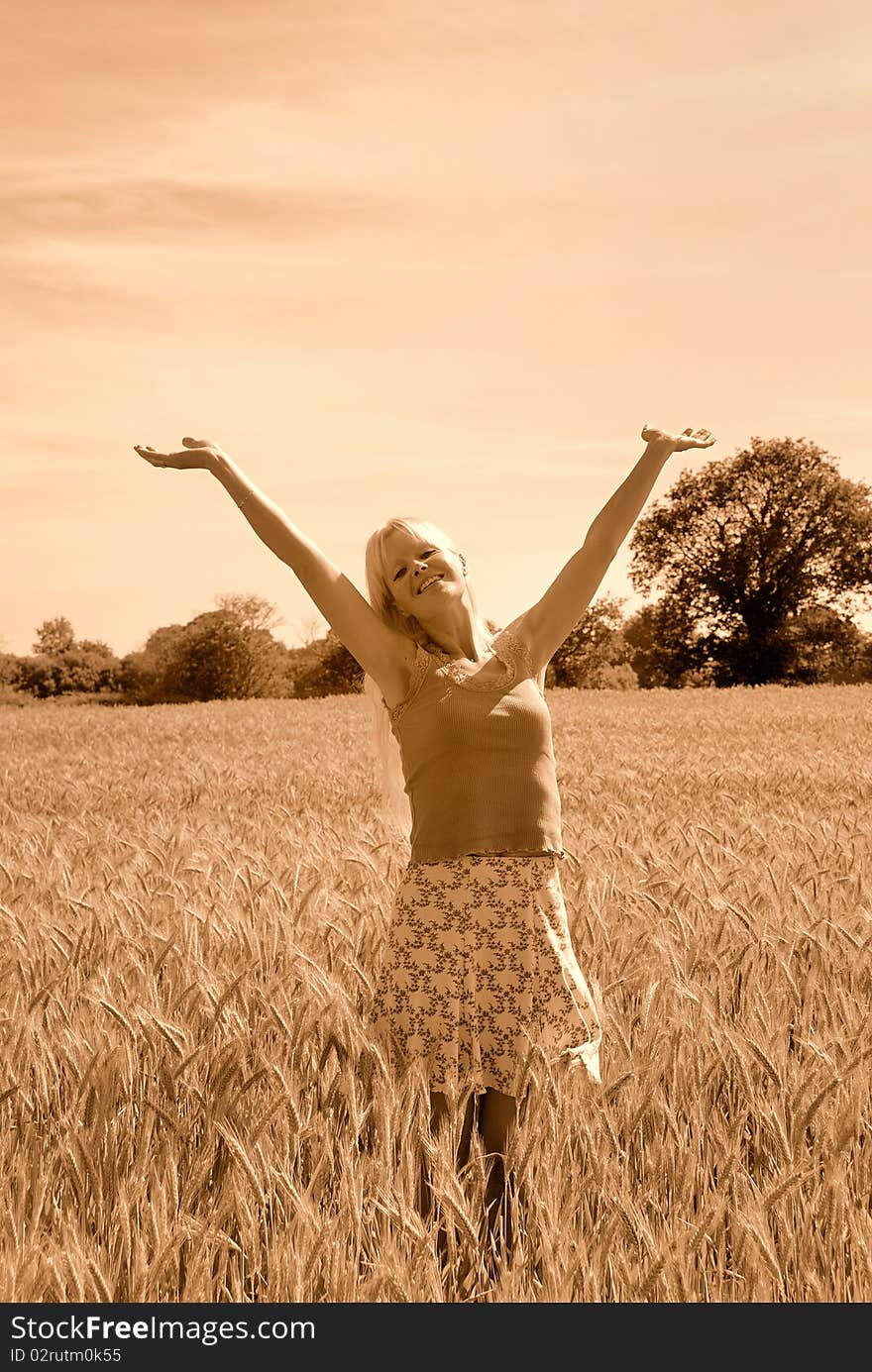 Blond woman in field