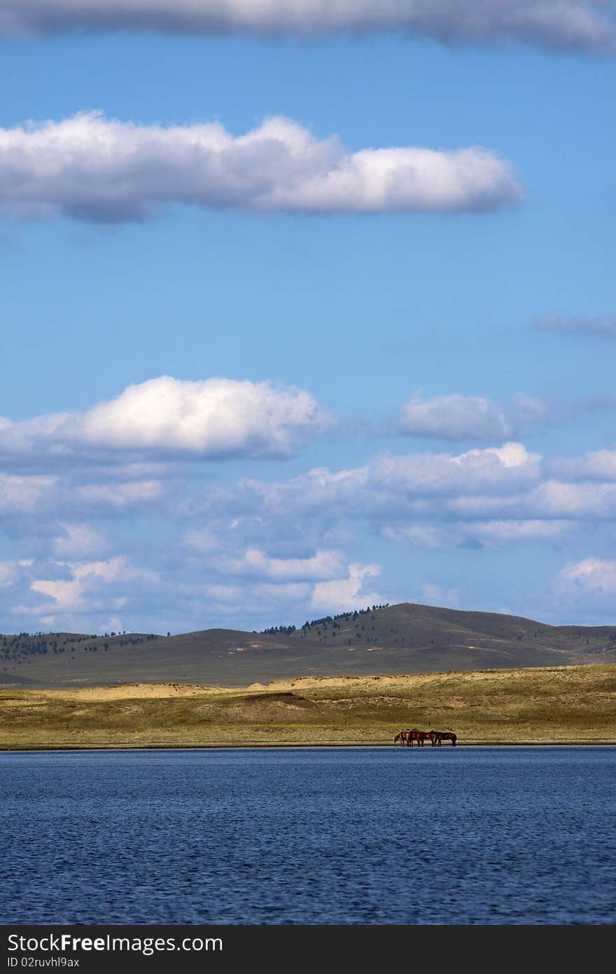 The blue lake in the summer prairies of Inner Mongolia, China