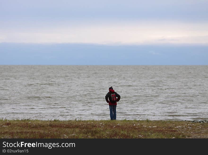 A solitude lady at lakefront