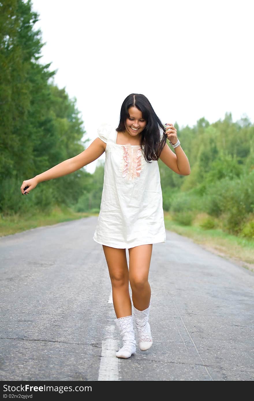 Pretty young woman in nature.