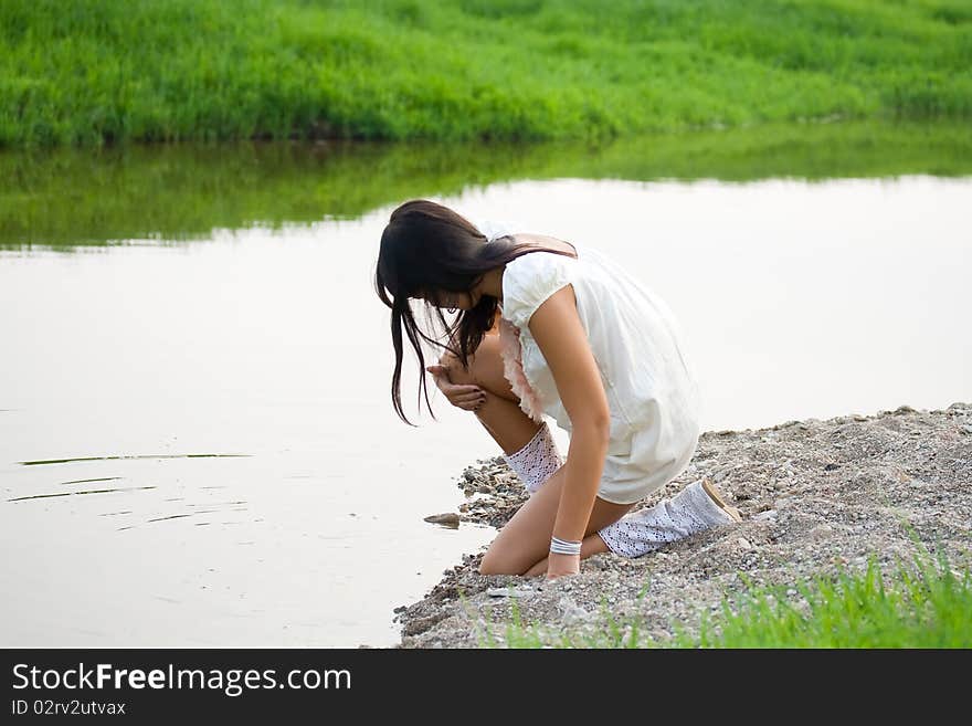 Pretty young woman in nature.