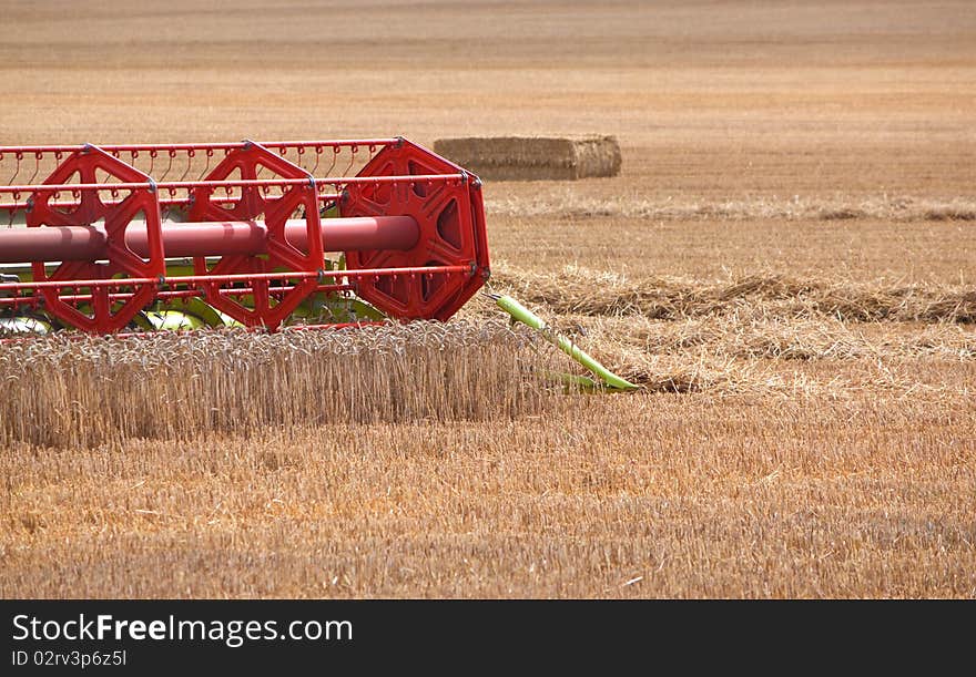 Combine harvester blades working in field