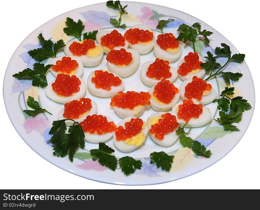 Caviar on quail eggs isolated on white