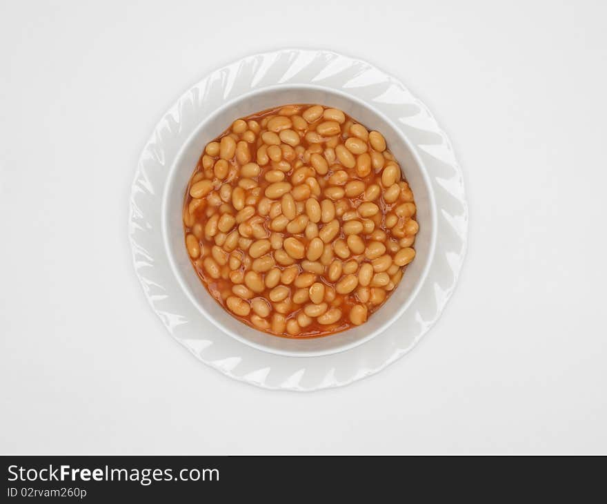 Bowl of baked beans on white background. Bowl of baked beans on white background