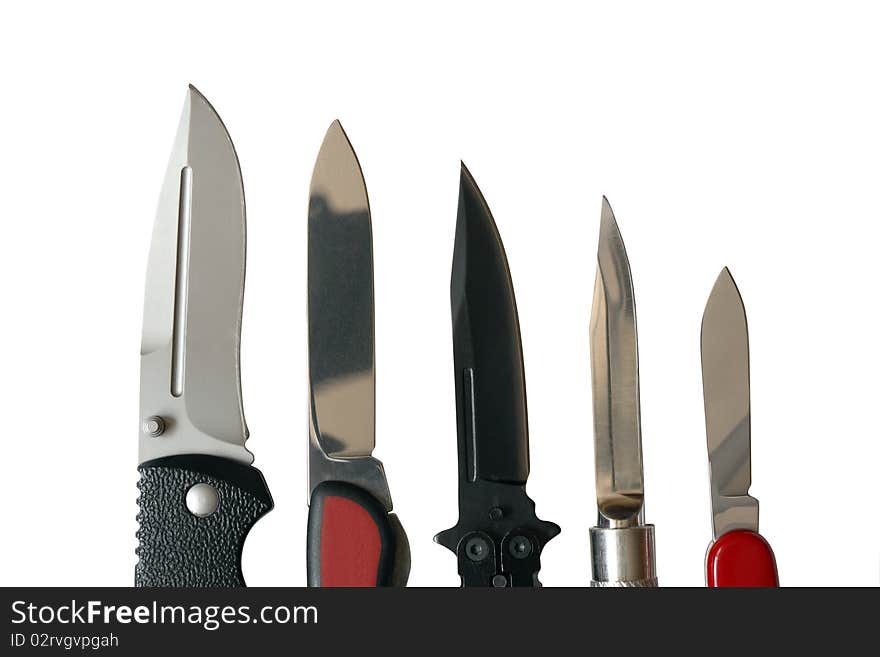 Closeup of few sharp knives isolated on white background with clipping path