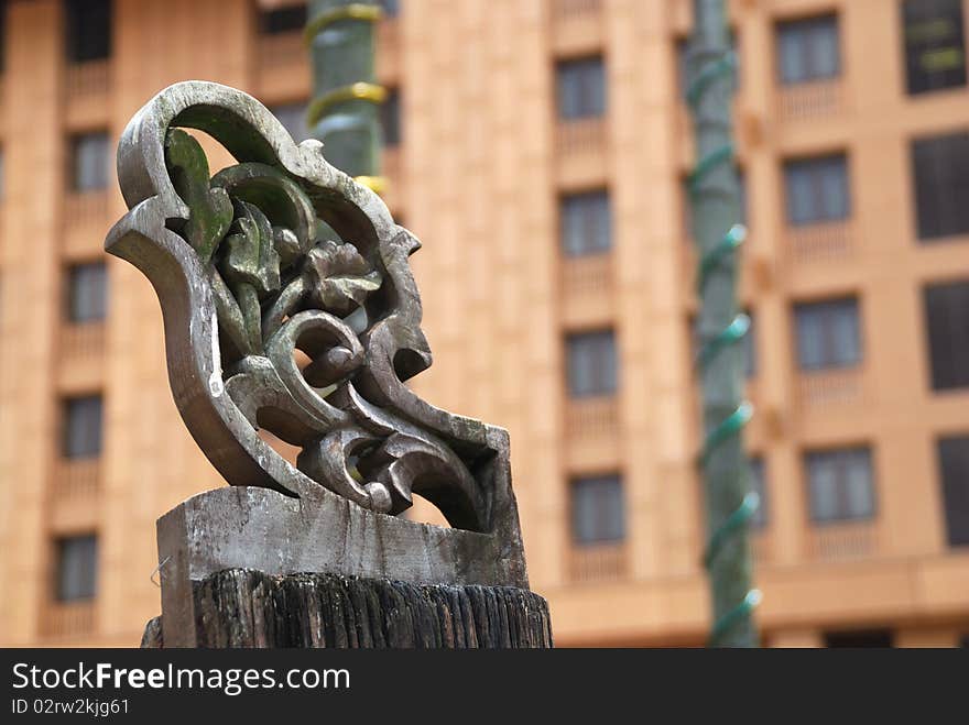 Image of carved details on old wooden structure. Image of carved details on old wooden structure