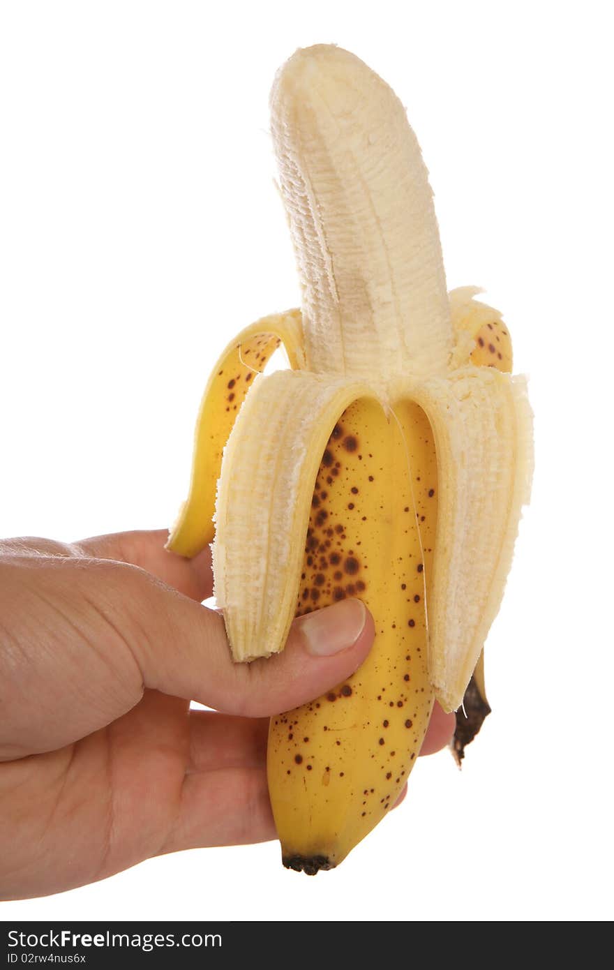 Hand Holding Peeled Banana