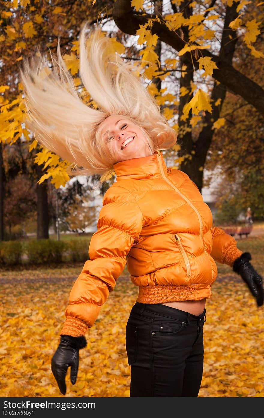 Beautiful young happy woman outdoors. Beautiful young happy woman outdoors