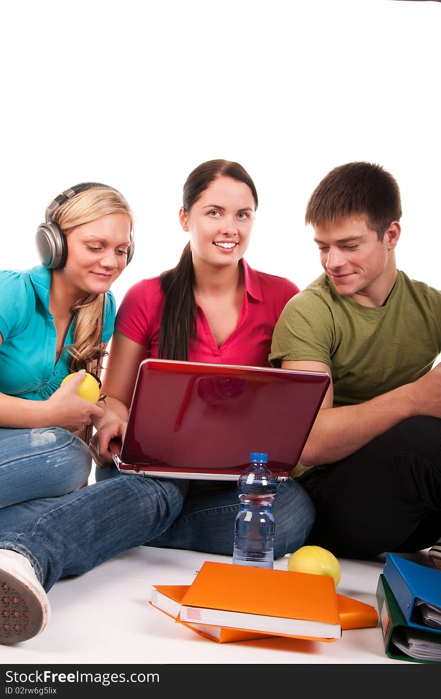 Group of students having fun, doing home work