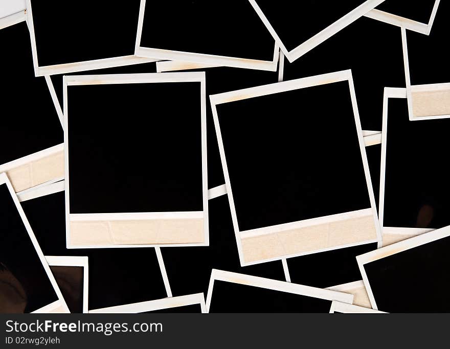 Image of a random assortment/layout of a handful of empty instant prints. Image of a random assortment/layout of a handful of empty instant prints.