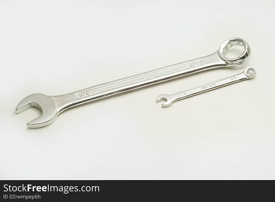 Two chrome spanners on a white background. Two chrome spanners on a white background