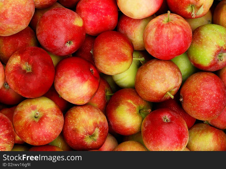 Bunch of organic fresh apples on a market