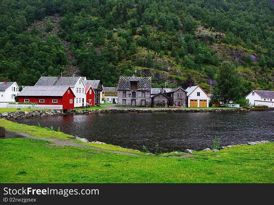 Traditional wooden houses on hillside background in Lyrdal, Norway. Traditional wooden houses on hillside background in Lyrdal, Norway