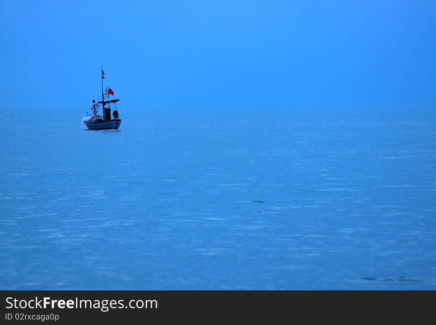 Thai fisherman net to catch fish in the early morning. Thai fisherman net to catch fish in the early morning.