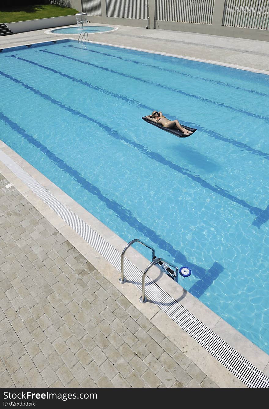 Woman Relax On Swimming Pool