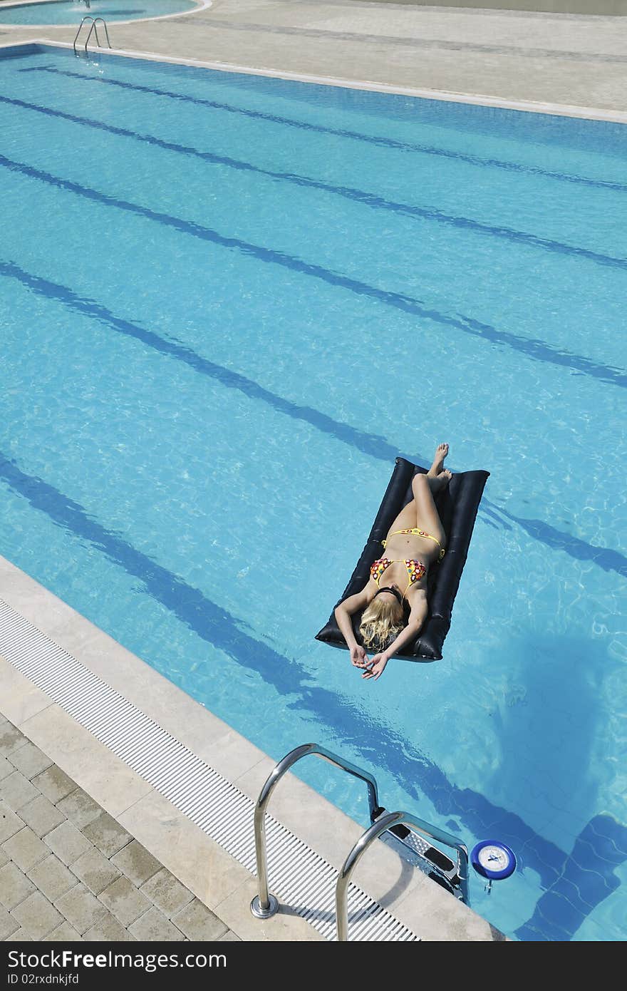 Woman Relax On Swimming Pool