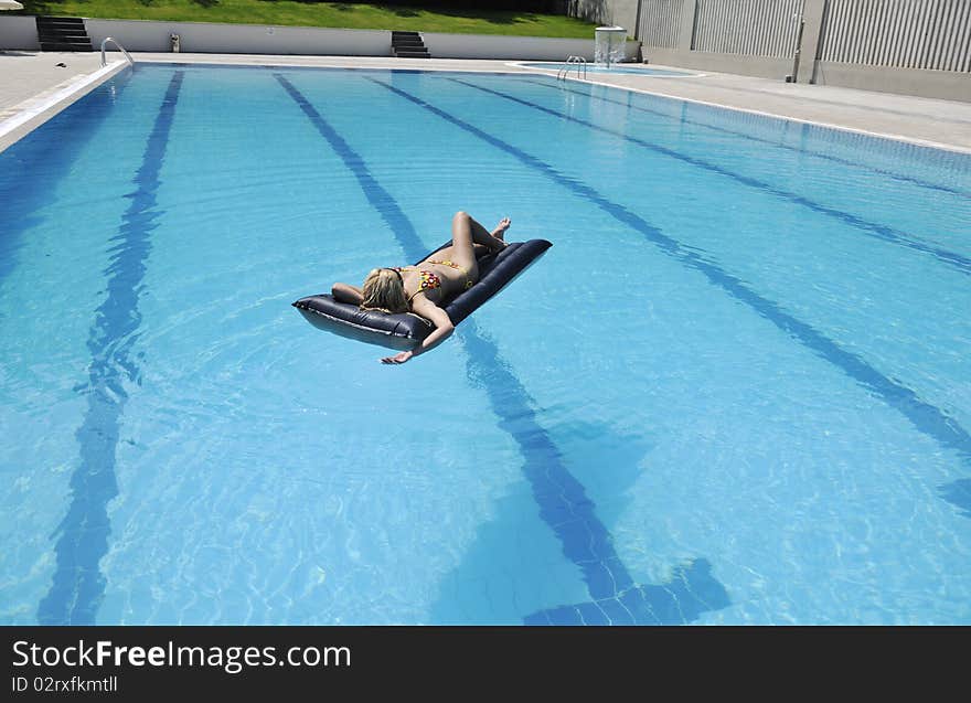 Woman Relax On Swimming Pool