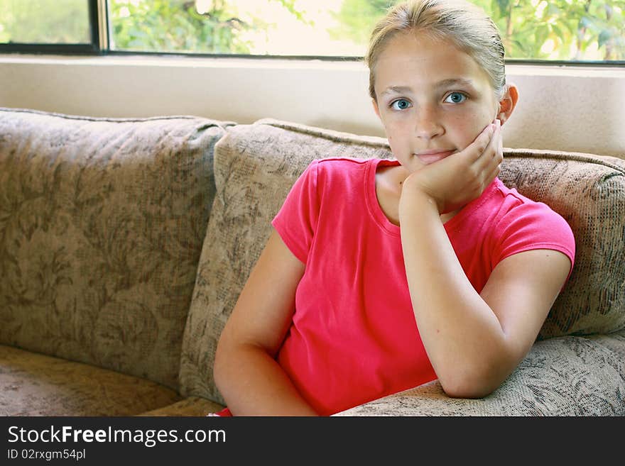 Girl sitting on couch